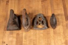 Three Antique Clothes Irons and Trivet