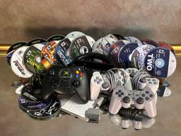 Assorted Game Conscole Controllers with Game Disks