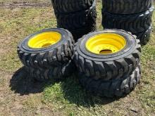 (4) Unused 10-16.5 Montreal SS Loader Tires with Rims