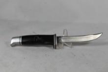 Buck Model 118 Sheath knife with 4.25 inch blade. Original leather sheath. Knife is in good