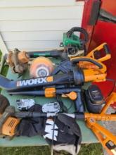 Worx yard tool with batteries and charger, weedeater, gas blower, and electric blower