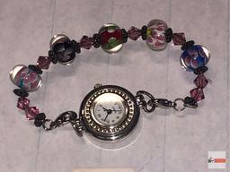 Jewelry - Woman's wrist watch, beaded band