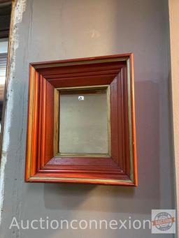 Wood framed wall mirror