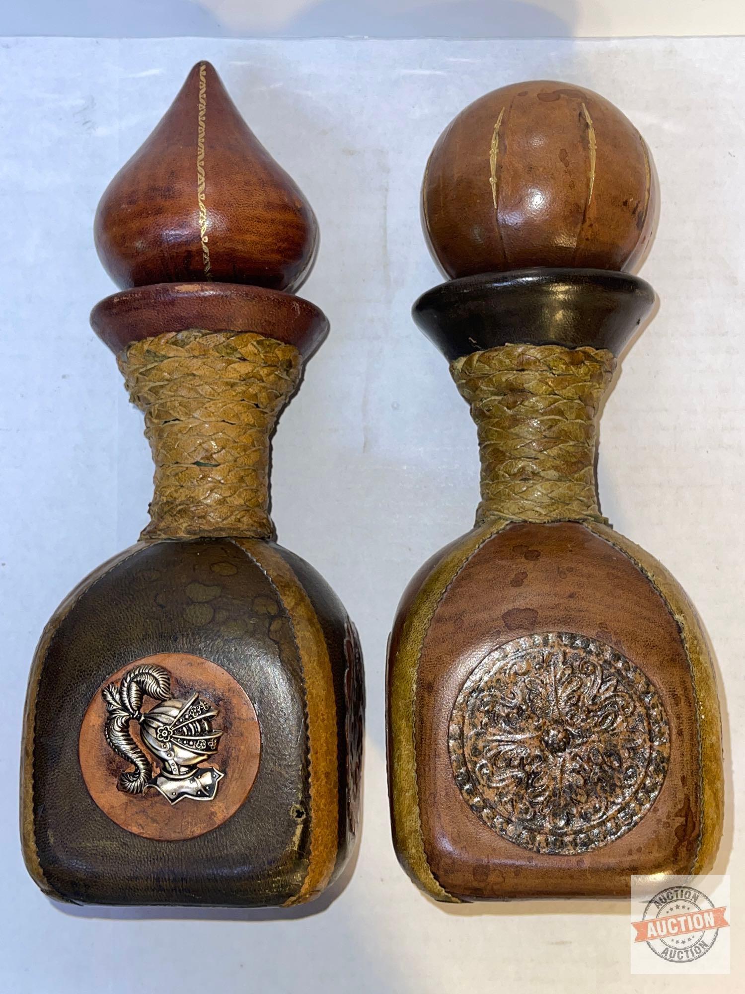 2 Mid Century Italian hand tooled leather wrapped wine decanters