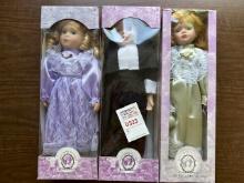 (3) porcelain dolls