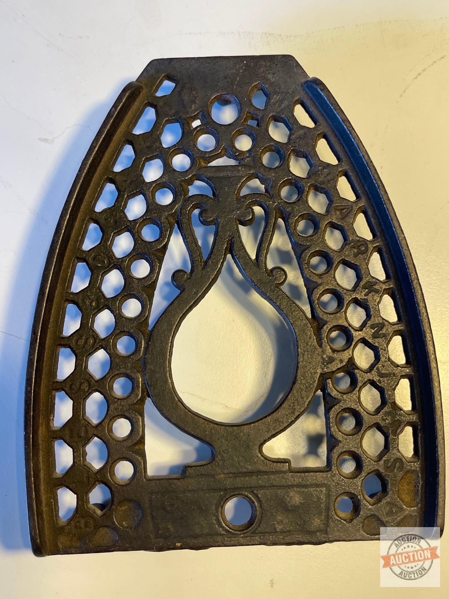 Vintage Sad Iron Trivets - 3 cast iron
