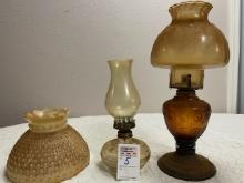2 oil lamps and one globe