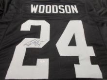 Charles Woodson of the Oakland Raiders signed autographed football jersey PAAS COA 345