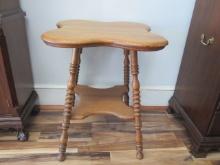 Antique Tiger Oak Clover Leaf Table with Undershelf and Turned Spindle Legs