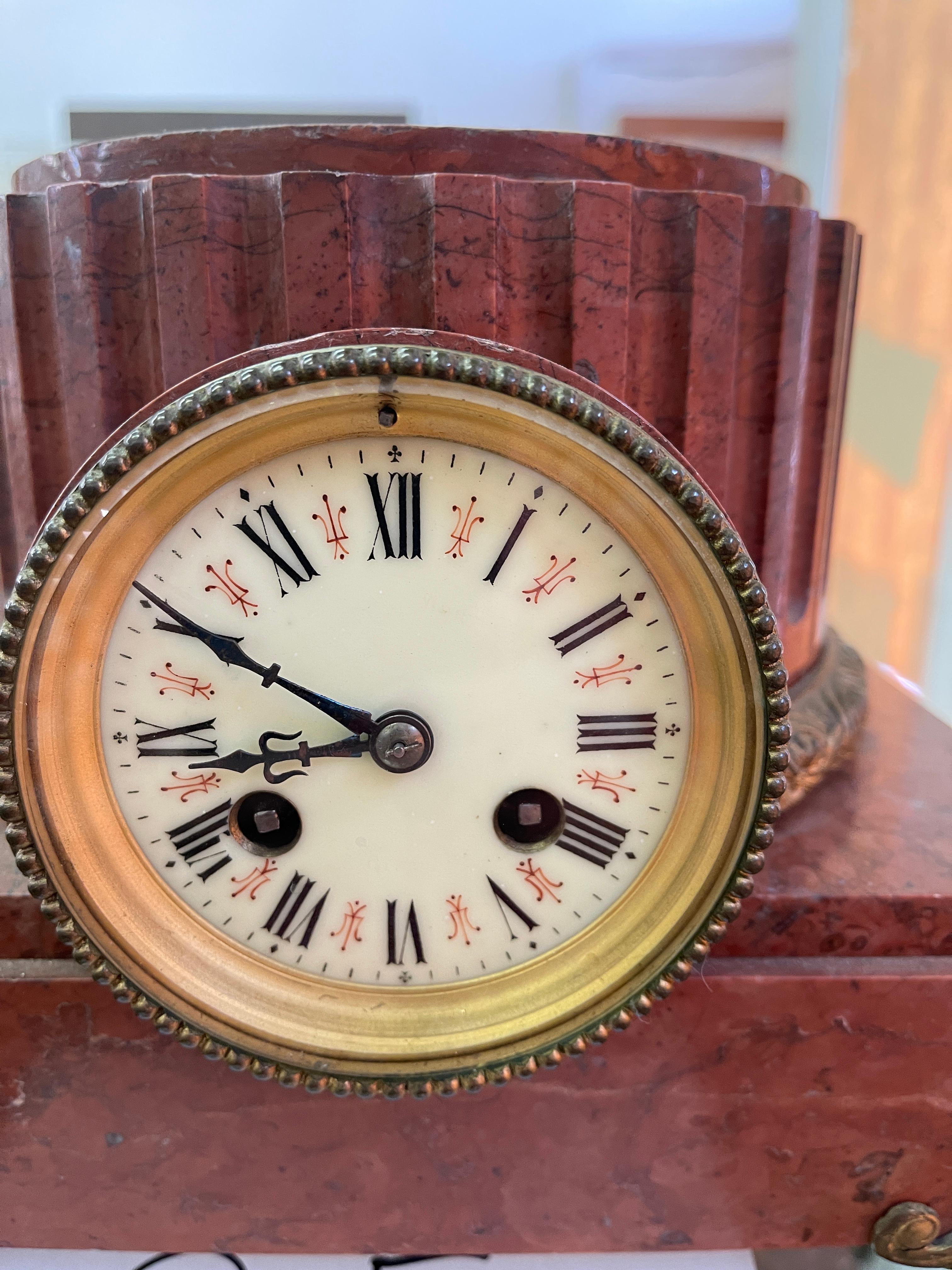 Red marble clock with gold metal