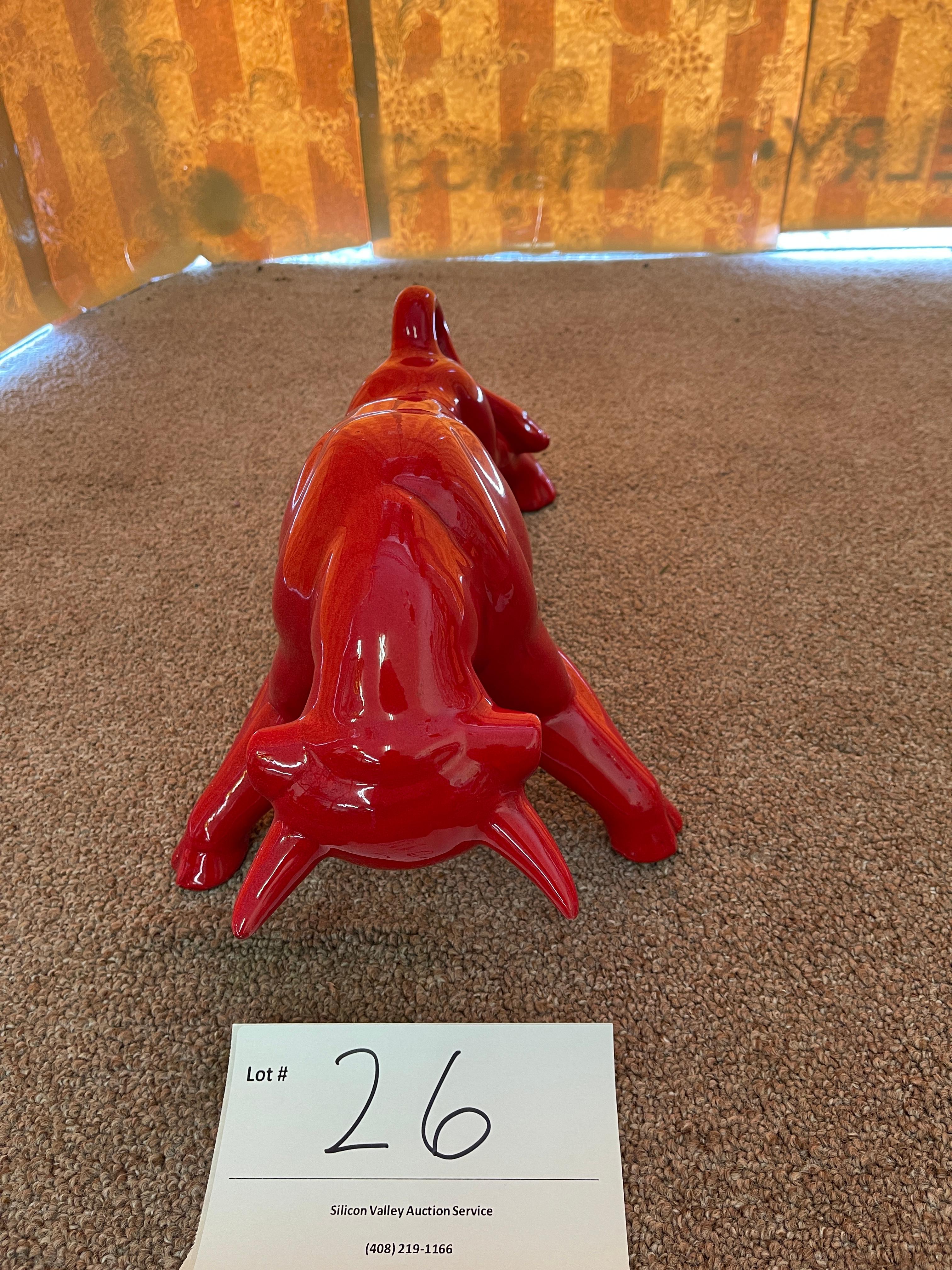 Red ceramic bull 18 1/2" long by 8" tall
