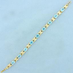 14ct Tw Swiss Blue Topaz And Diamond Line Bracelet In 14k Yellow Gold