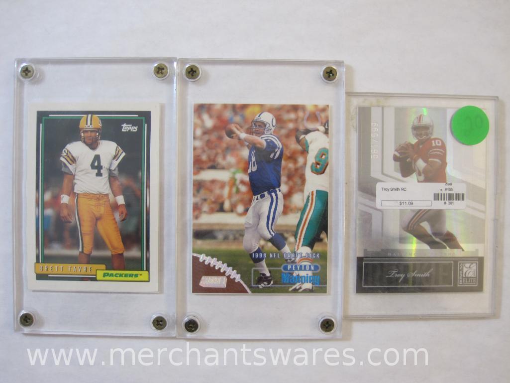 Three NFL Trading Cards including Donruss Troy Smith Serial Numbered 561/599, 1992 Topps Brett Favre