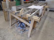 Finishing Table Made Up Of (2) Heavy Duty Saw Horses And (5) Concrete Skree