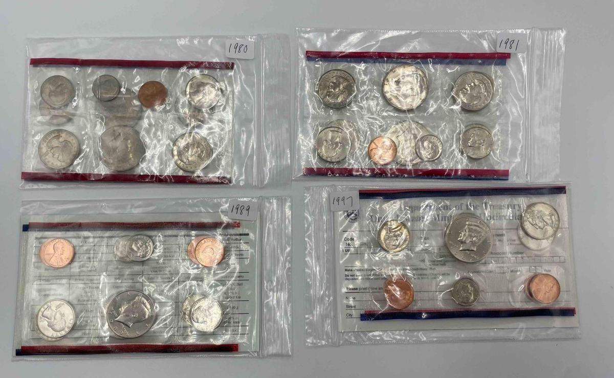 US Mint Sets: 1980, 1981, 1989, 1997 US Mint Sets -P,D in original cellophane, no envelope. 1999,