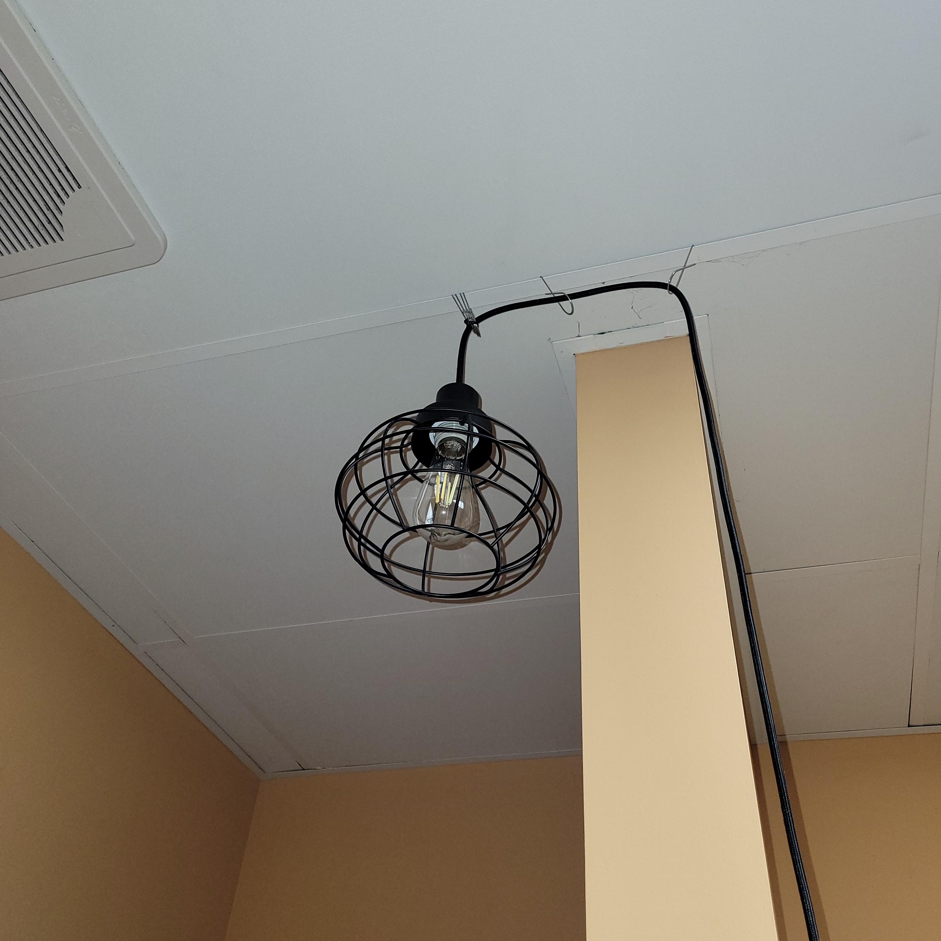 BLACK PLUG IN HANGING LIGHT, CAGE STYLE