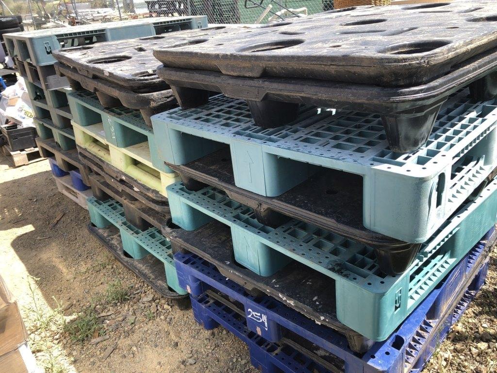 Stacks of Misc Plastic Pallets.