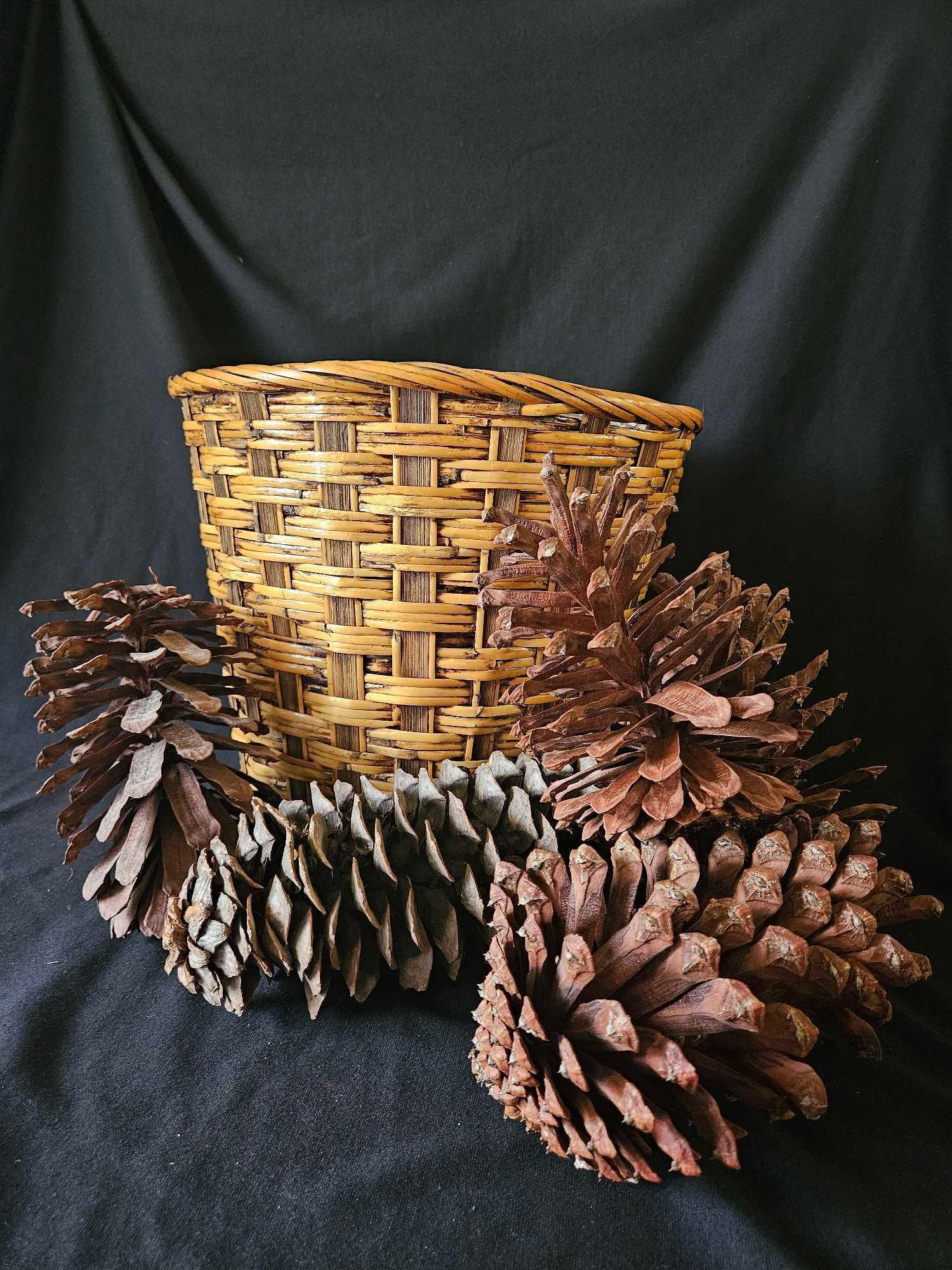 LARGE VINTAGE WOVEN BASKET WITH CURIOUSLY LARGE PINECONES