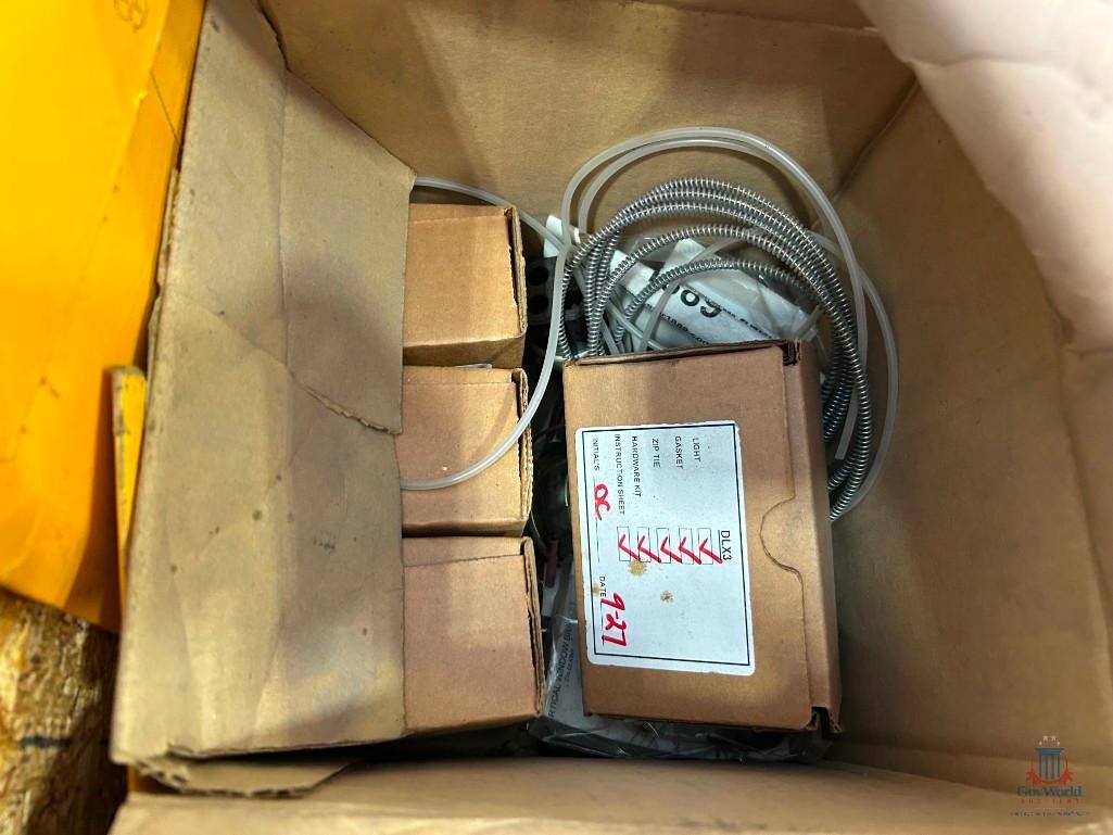 CONTAINER OF TRUCK PARTS AND BATTERY TESTER
