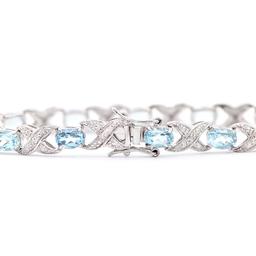 Plated Rhodium 11.26ctw Blue Topaz and Diamond Bracelet