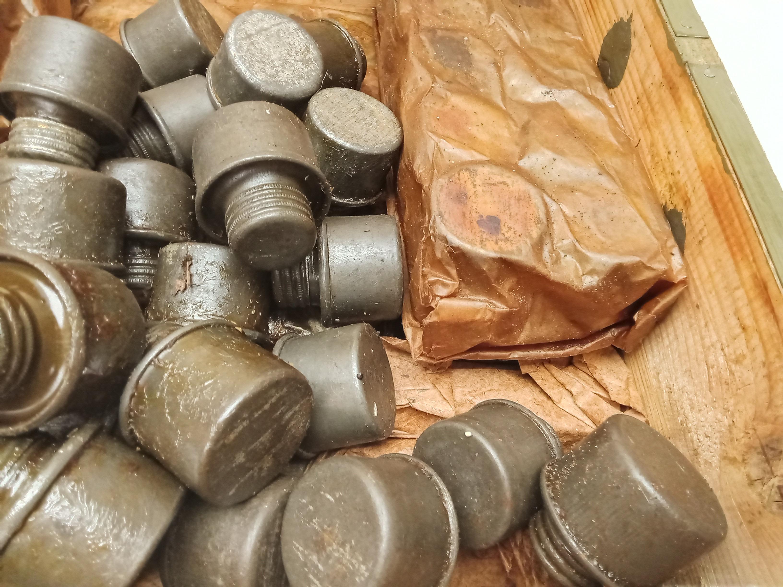 CRATE OF RUSSIAN MADE RIFLE OIL BOTTLES