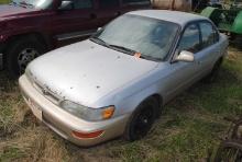 **T** 1997 Toyota Corolla DX, 4-door, automatic, cloth interior, power windows/locks, 1.8L engine, r