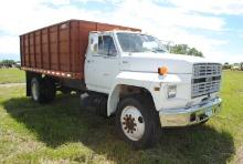 **T** 1985 Ford grain truck with hoist, Obeco 15' metal box, wood floor, grain door, single axle, V8