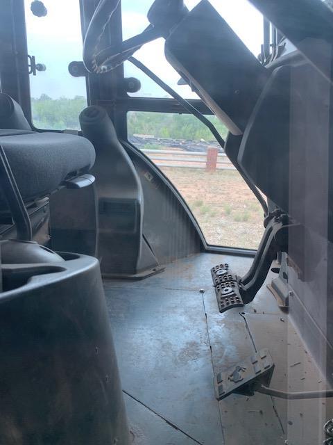 2004 JD 310SG Backhoe