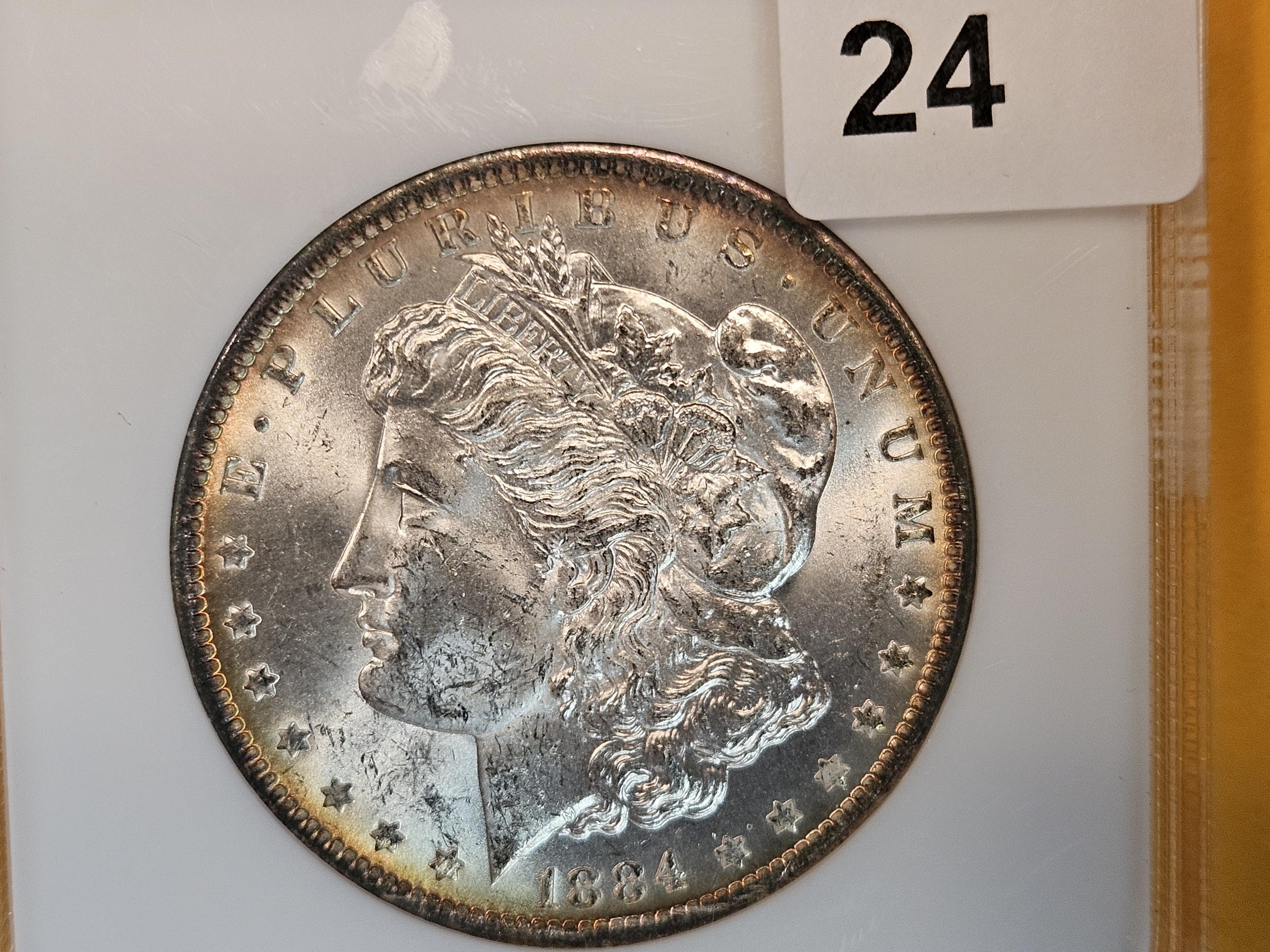 NGC 1884-O Morgan Dollar in Mint State 63