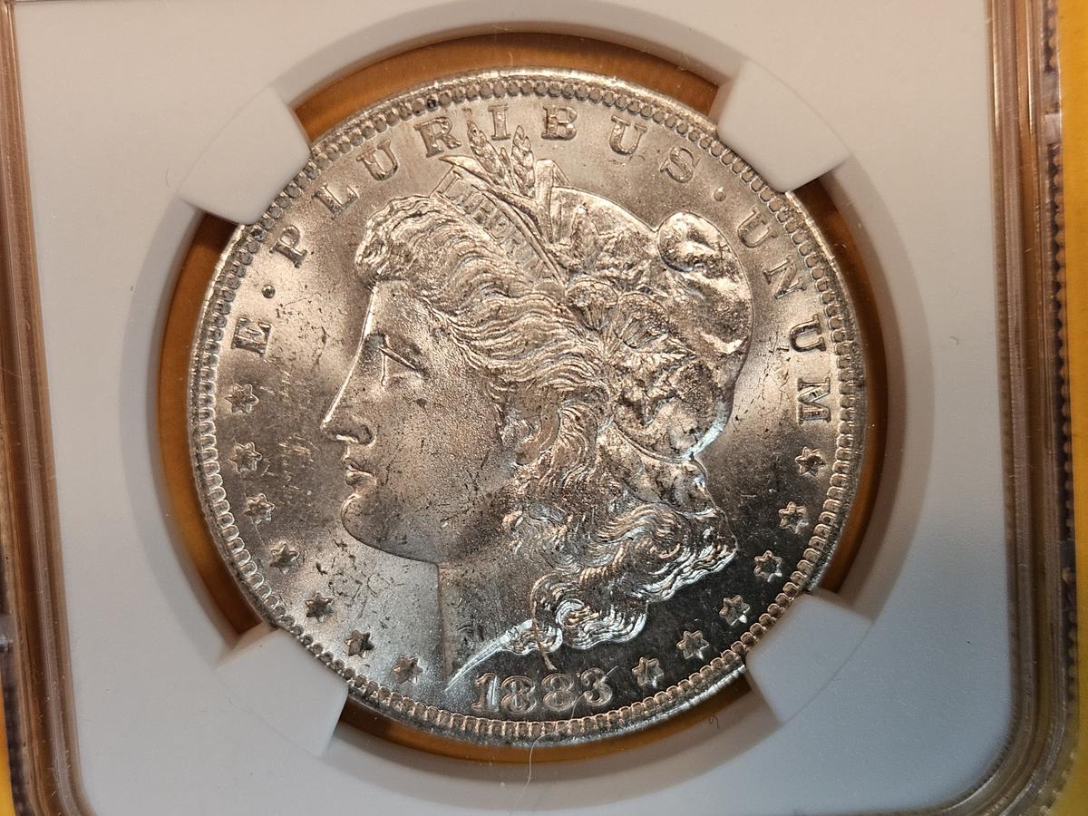 NGC 1883-O Morgan Dollar in Mint State 63