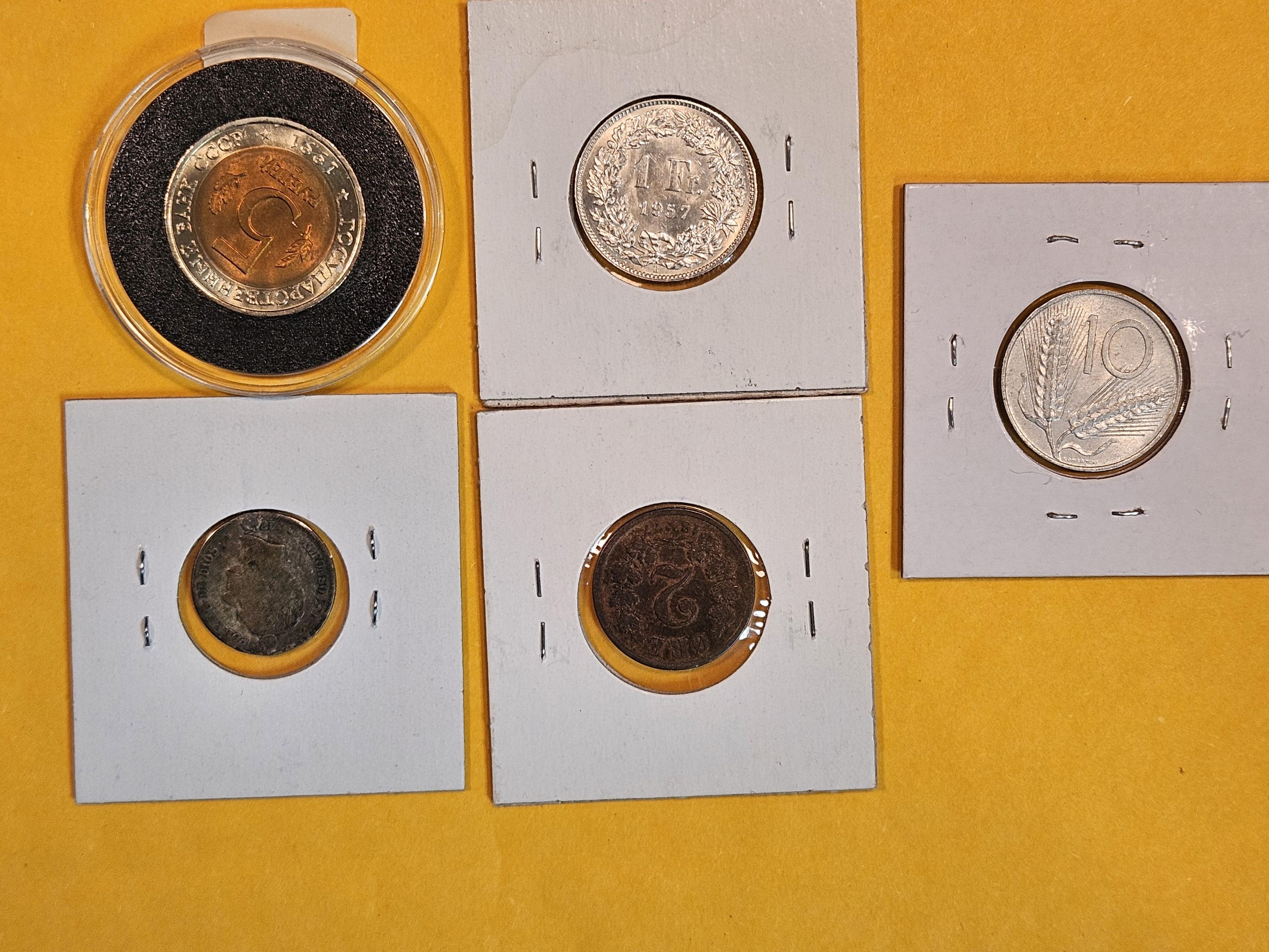 Five mixed World Coins