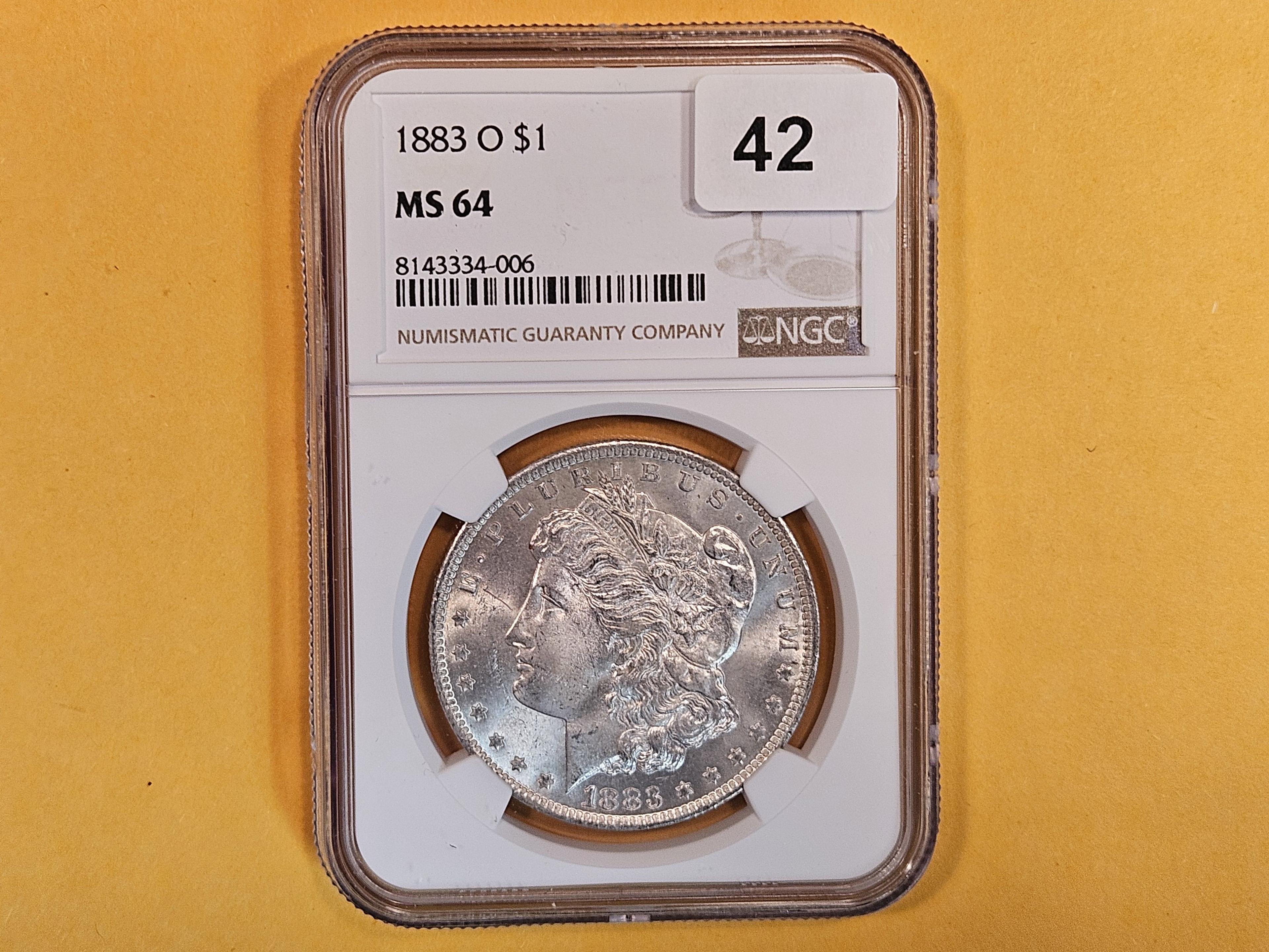 NGC 1883-O Morgan Dollar in Mint State 64