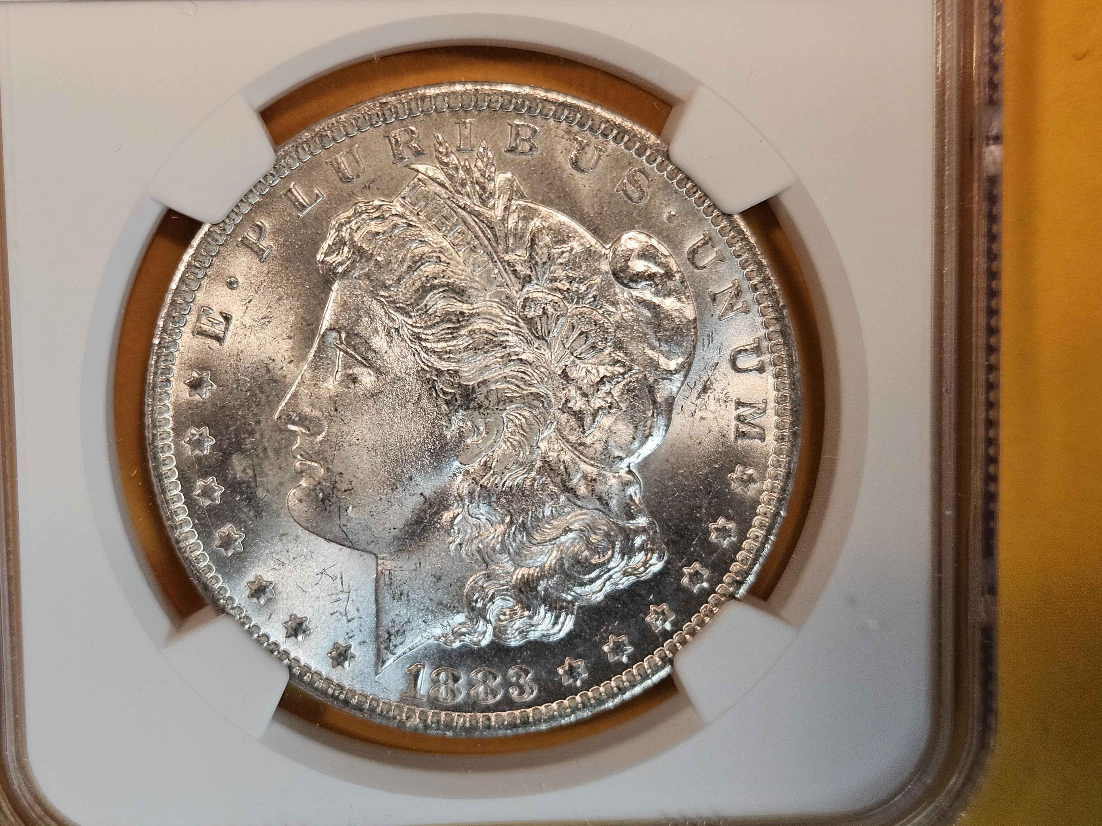 NGC 1883-O Morgan Dollar in Mint State 64