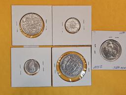 Five silver coins from Switzerland