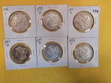 Six Morgan Silver Dollars