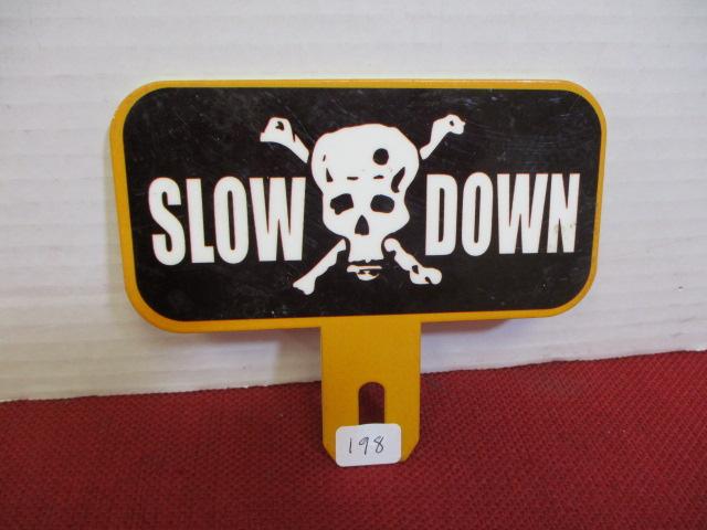 Porcelain License Plate Topper-Slow Down w/ Skull & Cross Bones