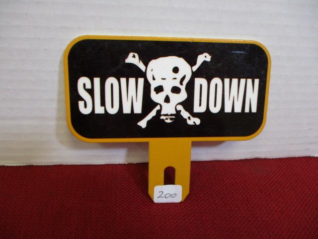 Porcelain License Plate Topper-Slow Down w/ Skull & Cross Bones