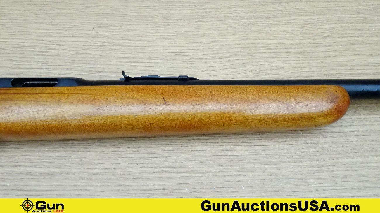 REVELATION 101 .22 S-L-LR Rifle. Good Condition. 20" Barrel. Bolt-Action Features a Dovetail on Top