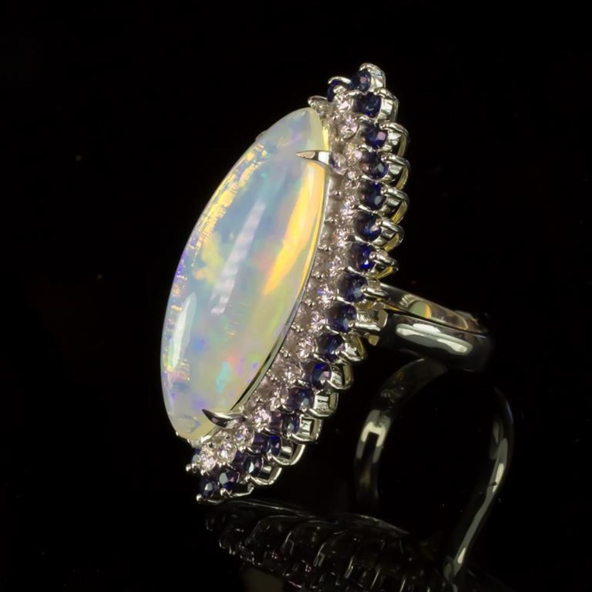 14K White Gold 15.65ct Opal 1.17ct Sapphire and 1.89ct Diamond Ring