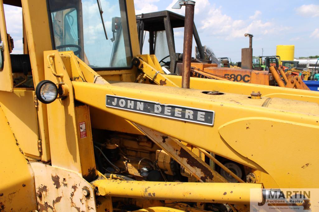 JD 310 backhoe