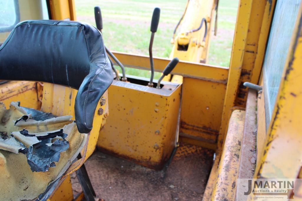 JD 310 backhoe