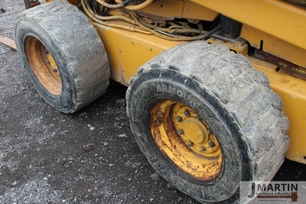 JD 8875 skid loader