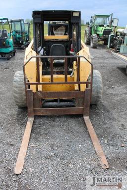 JD 8875 skid loader