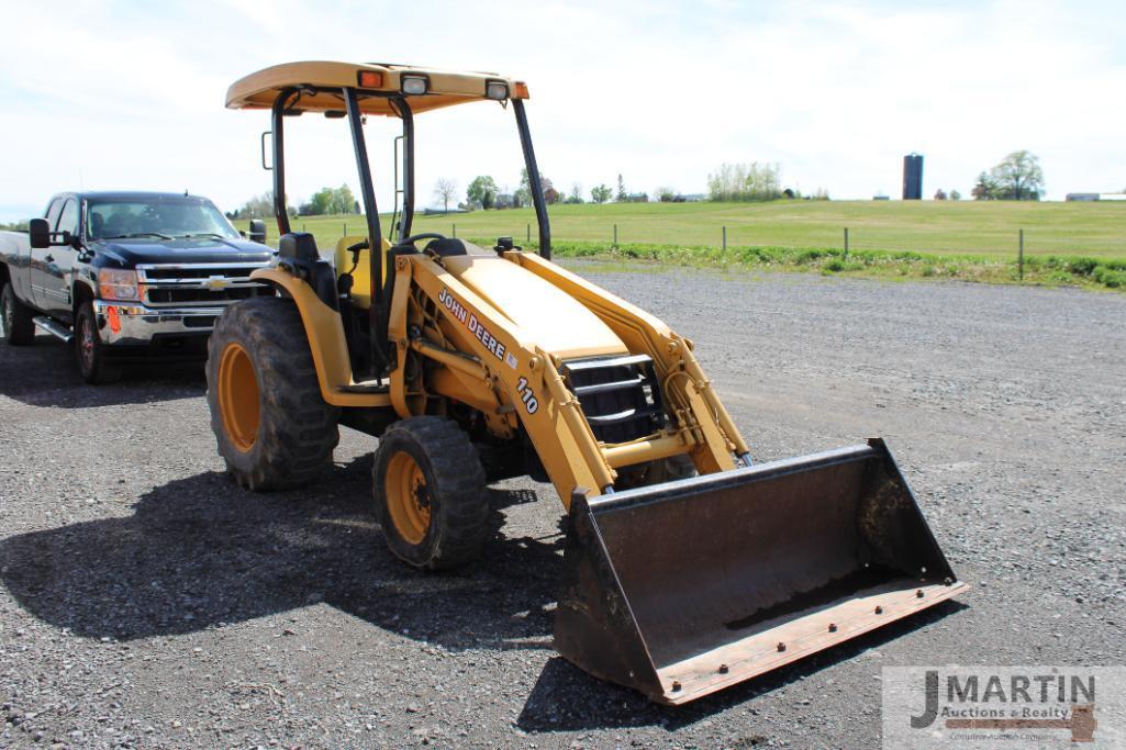 JD 110 loader tractor