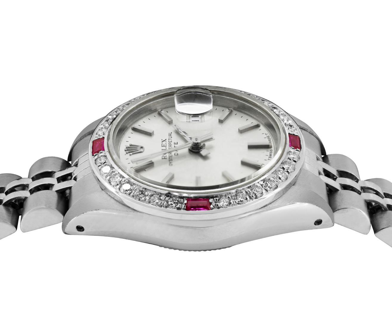 Rolex Ladies Stainless Steel Quickset Silver Index Dial Diamond And Ruby Bezel D