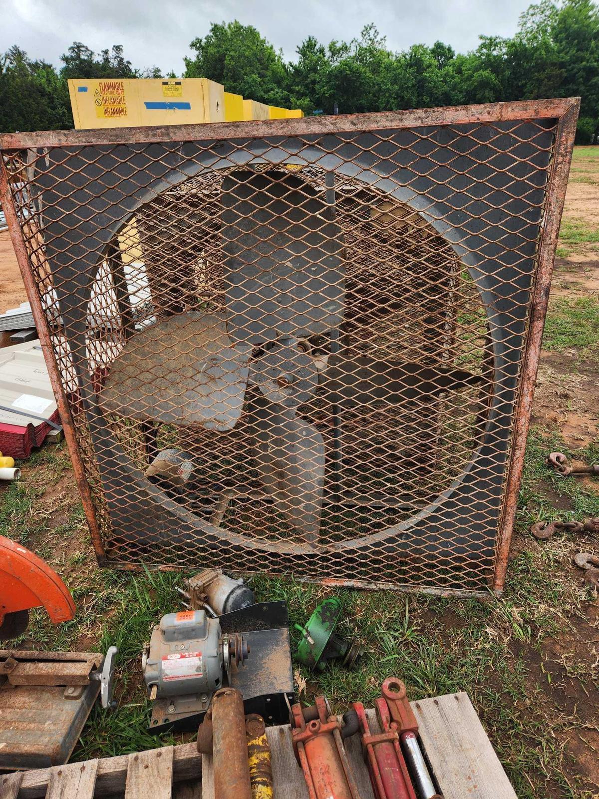 metal cage with fan and motor