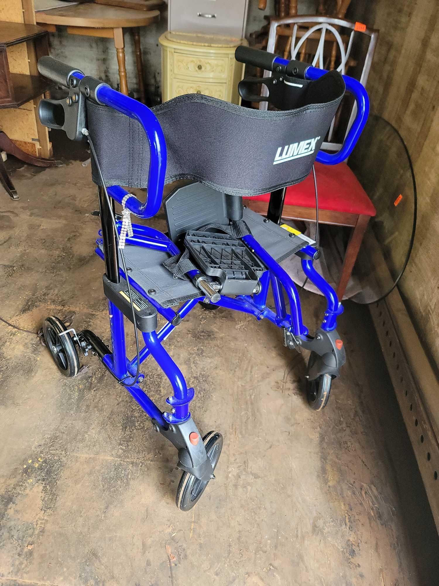 lumex walker/wheelchair with brakes and foot pega