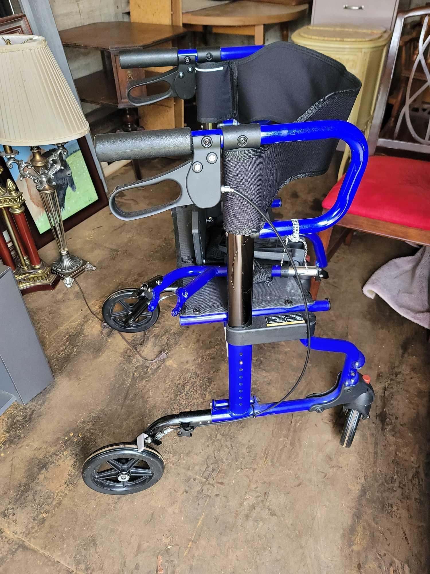 lumex walker/wheelchair with brakes and foot pega