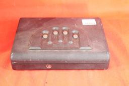 One metal GunVault finger touch gun safe with key. Used in good condition.