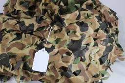 Three leaf cut camo boat/blind covers. Used.